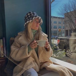 Fuzzy checkered bucket hat